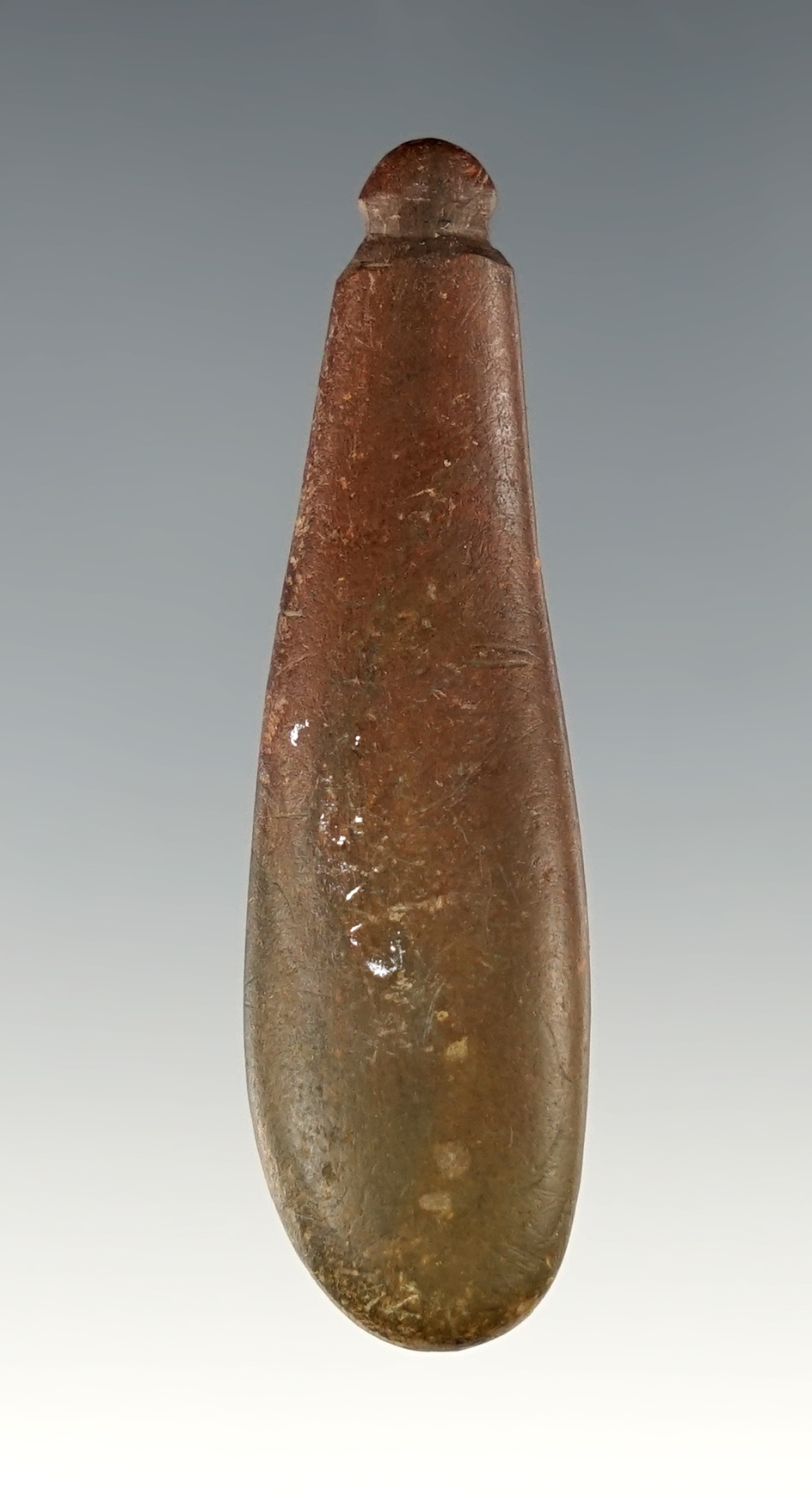 2" Charmstone that is well polished . Found in Plymouth, Washington.