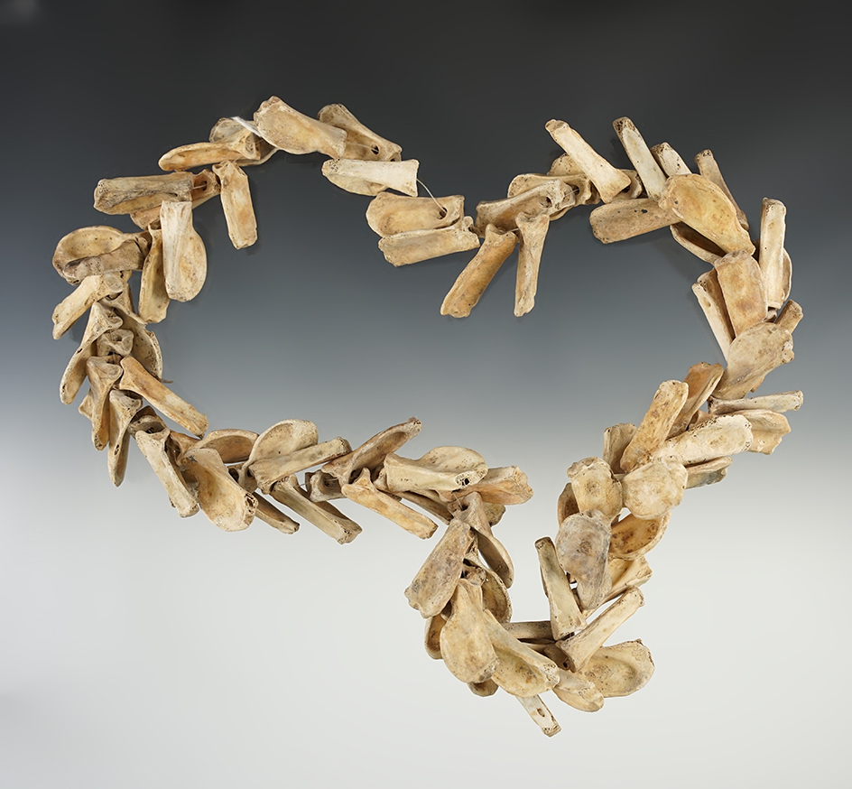 22" Strand of Drilled Bone Beads found in Smith County Virginia.