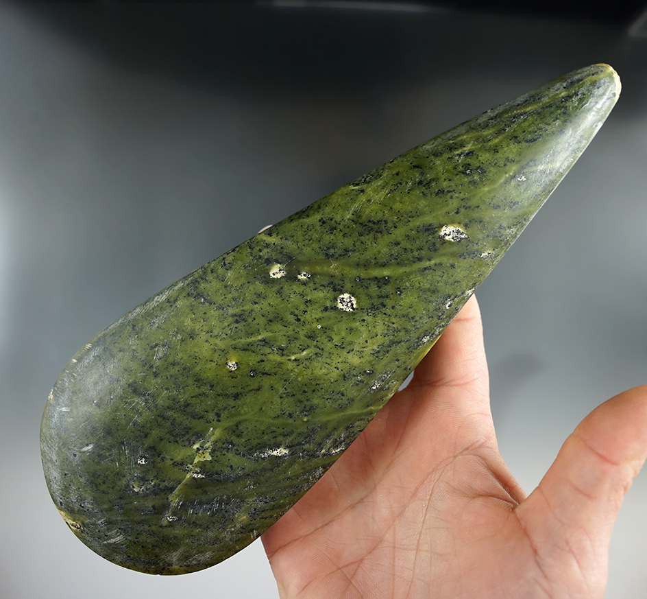 Beautiful green material on this 8 1/4" hardstone Celt found in New Guinea.