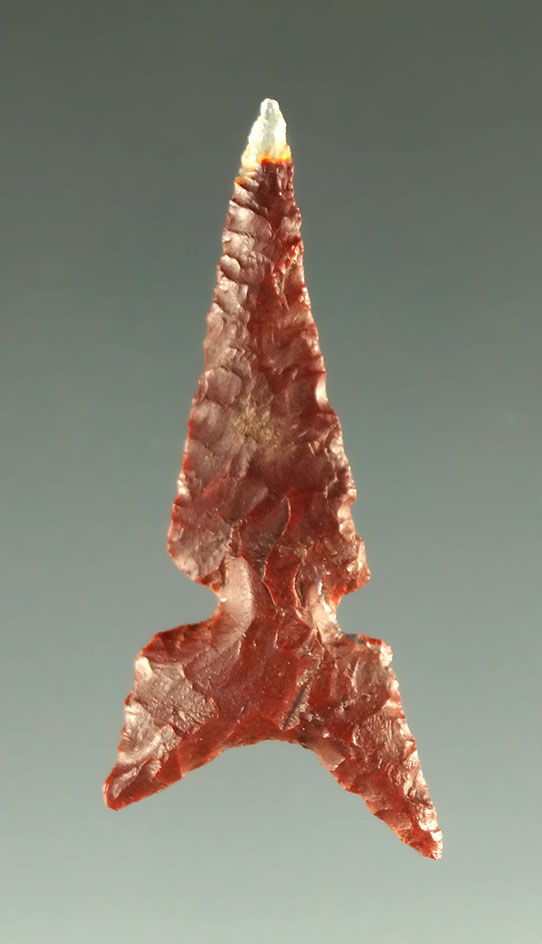 1 1/8" Awatovi Sidenotch point made from maroon and clear agate found in Mesa Co. Colorado.