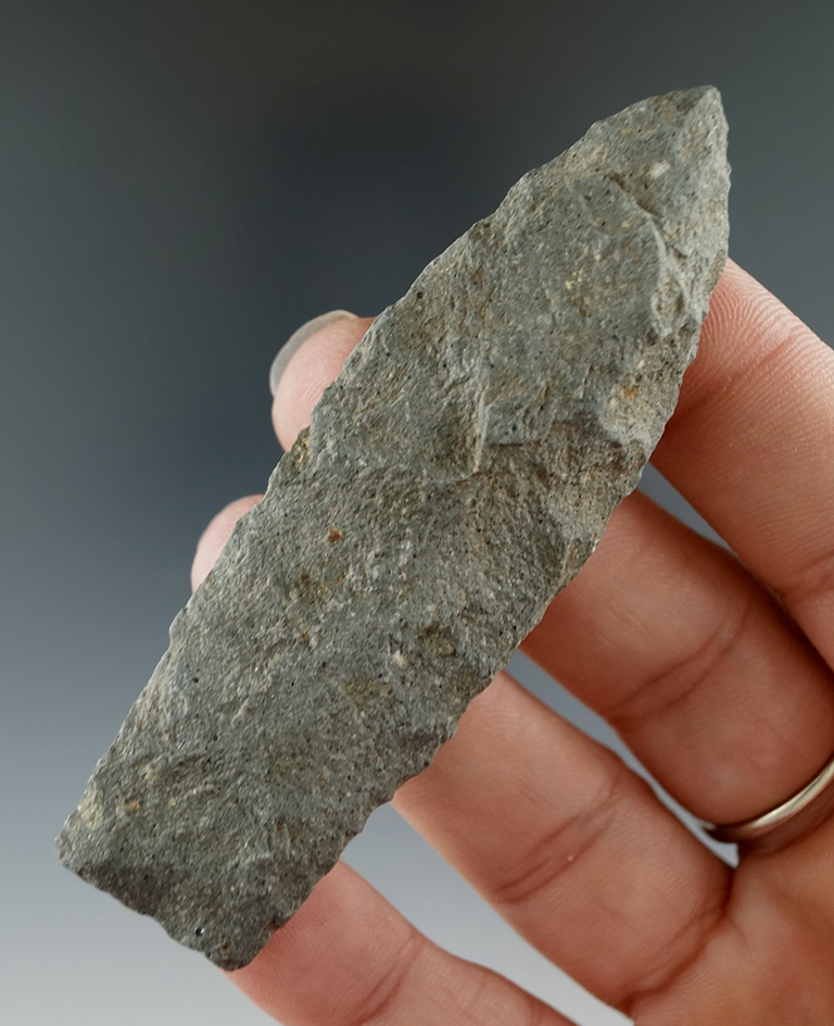 3 1/8" Paleo Stemmed Lanceolate with a nicely ground stem, found in Michigan.
