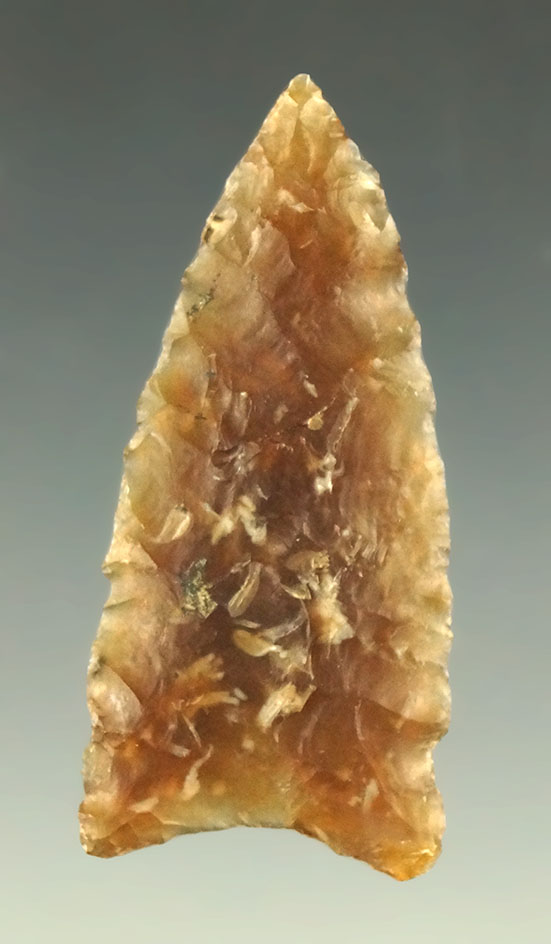 1 5/8" Knife River Flint Triangular Arrowhead found in the Dakotas.