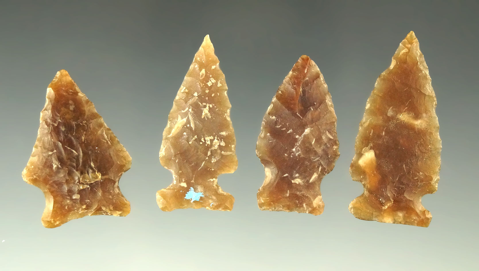Set of four Knife River Flint arrowheads found in the Dakotas area, largest is 1 1/2".