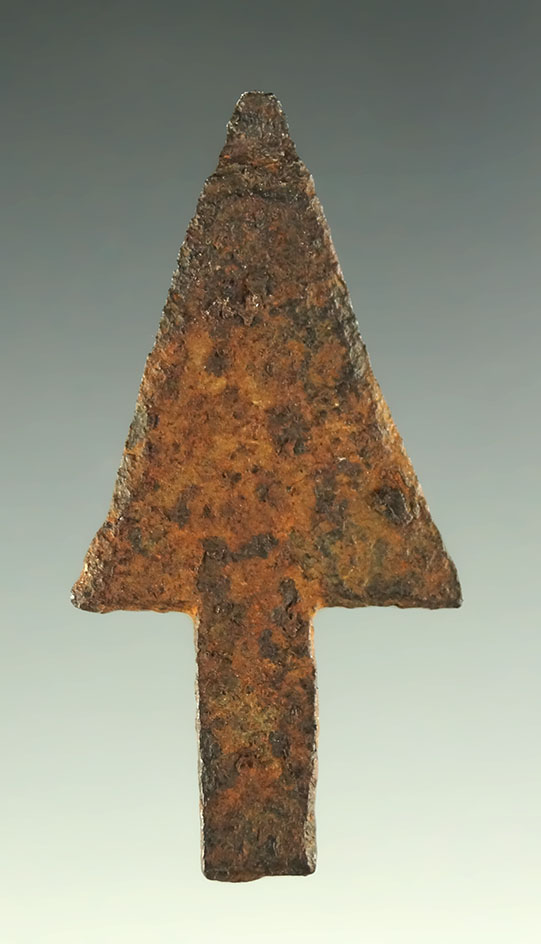 1 9/16" metal arrowhead most likely salvaged from a barrel band found in the Plains region.