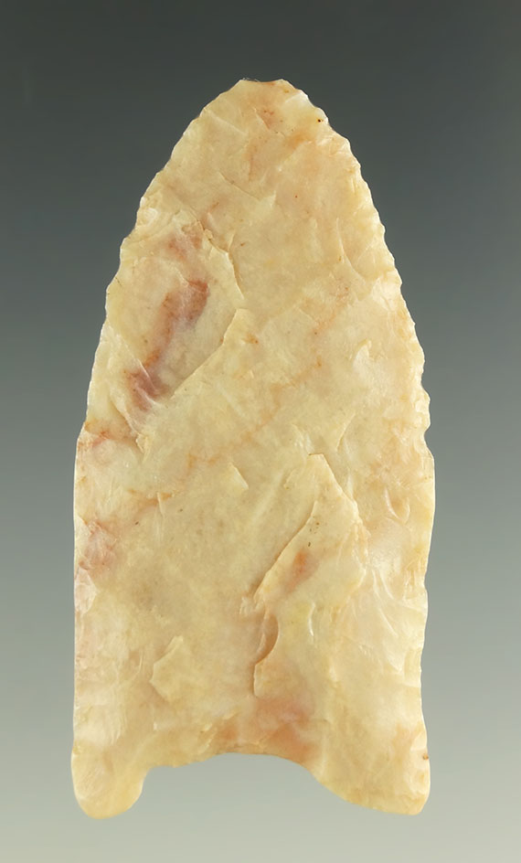 1 7/8" Alibates Flint Paleo with heavily ground lower edges that was glued to a board. Colorado.