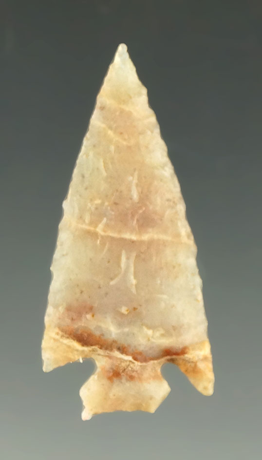 1 3/8" Cornernotch arrowhead made from nicely translucent Alibates Flint found in Colorado.