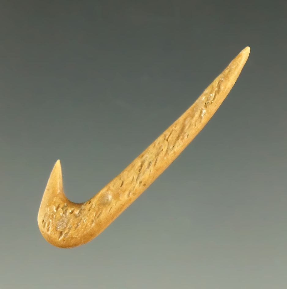 1 3/8" bone fishhook found in South Dakota.