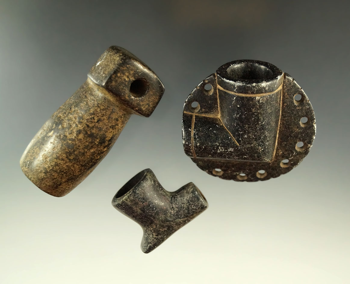Set of three stone pipes, exact age, found location and cultural affiliation unknown.
