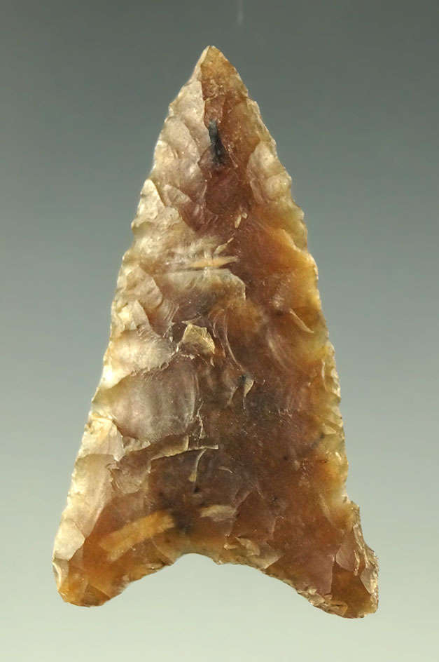 1 1/2" triangular arrowhead made from attractive semi translucent Knife River Flint - Nebraska.