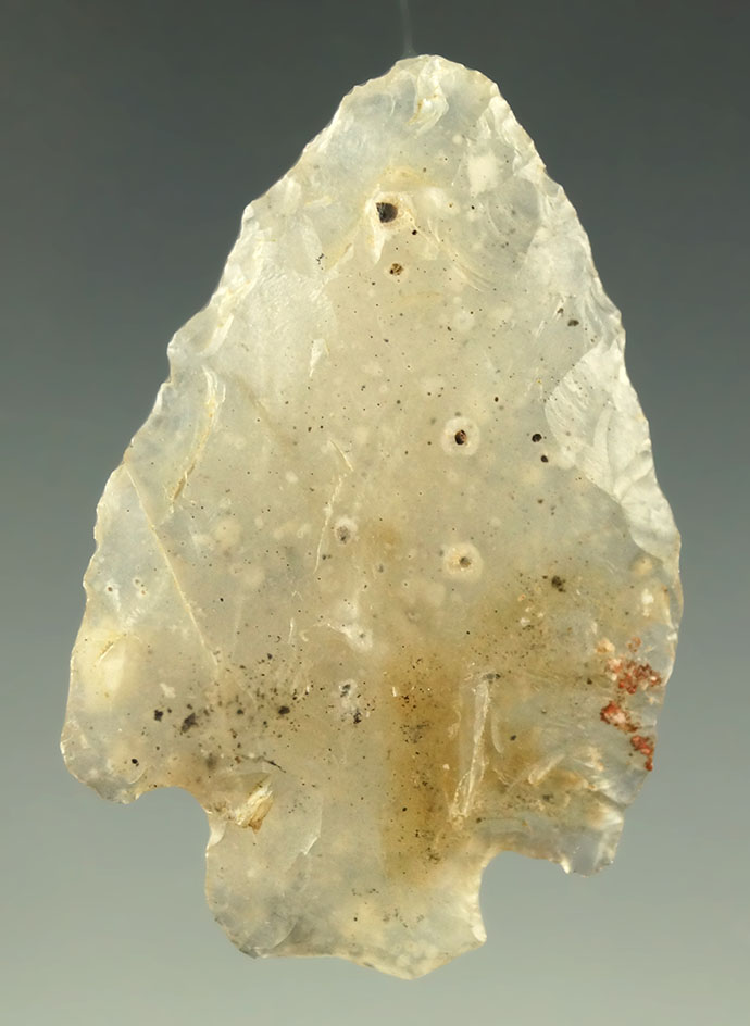 1 1/2" Stemmed point found in Colorado made from Highly translucent agate. Ex. Bob Roth.