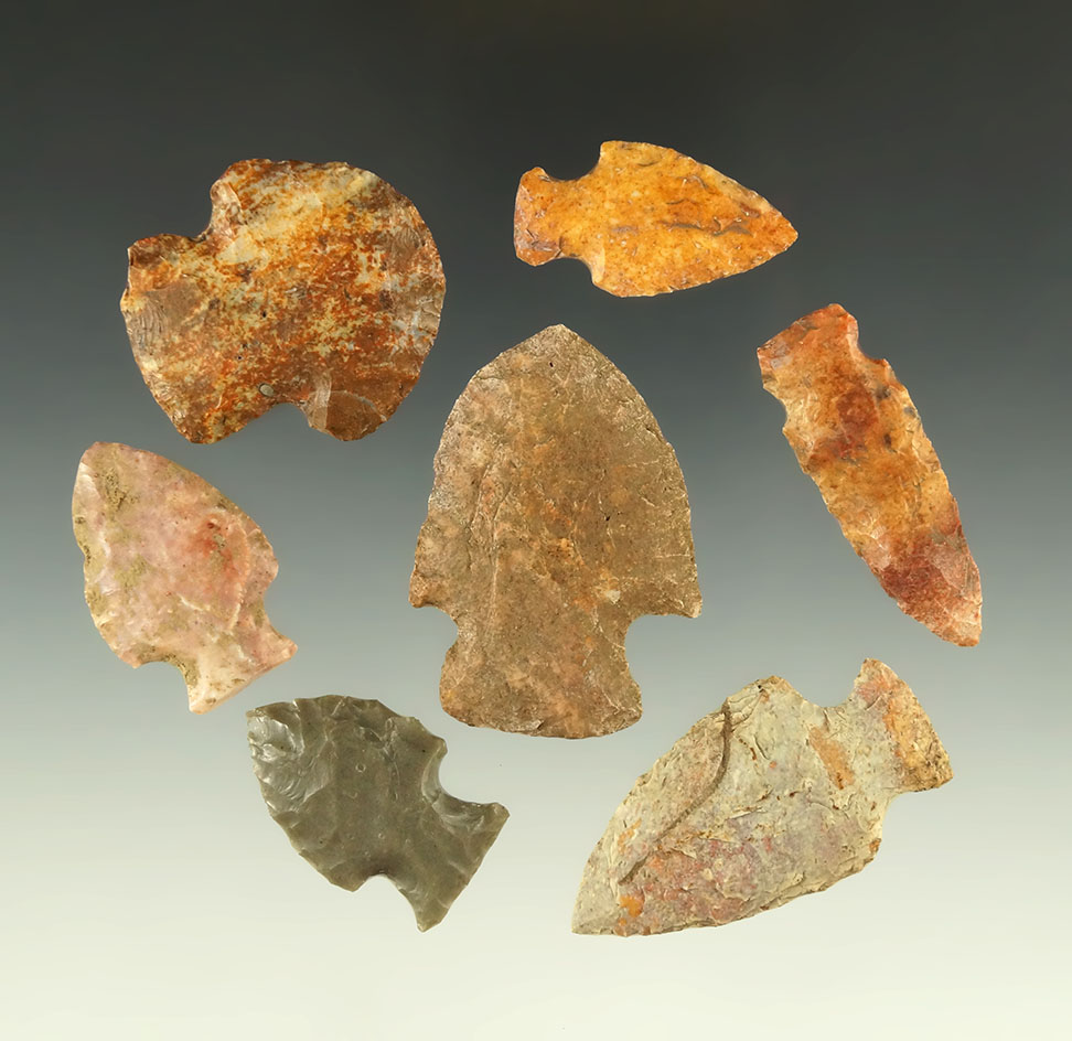 Set of seven assorted arrowheads found in Osborne County Kansas. Colorful materials.