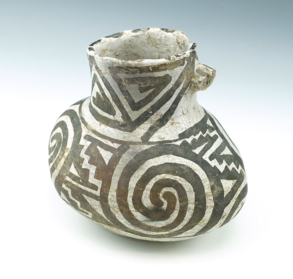 4 1/4" Long x 3 1/2" tall nicely painted Anasazi pottery vessel found in New Mexico.