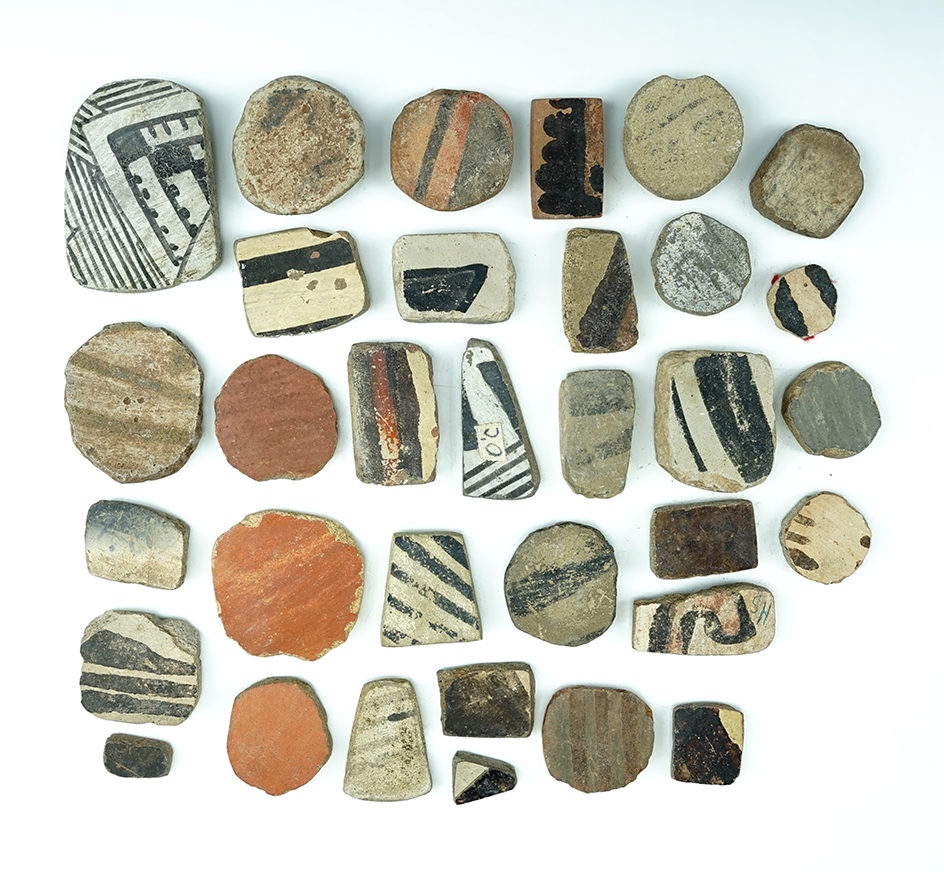 Set of 32 anciently salvaged pottery shards in various shapes. All found in New Mexico. The largest