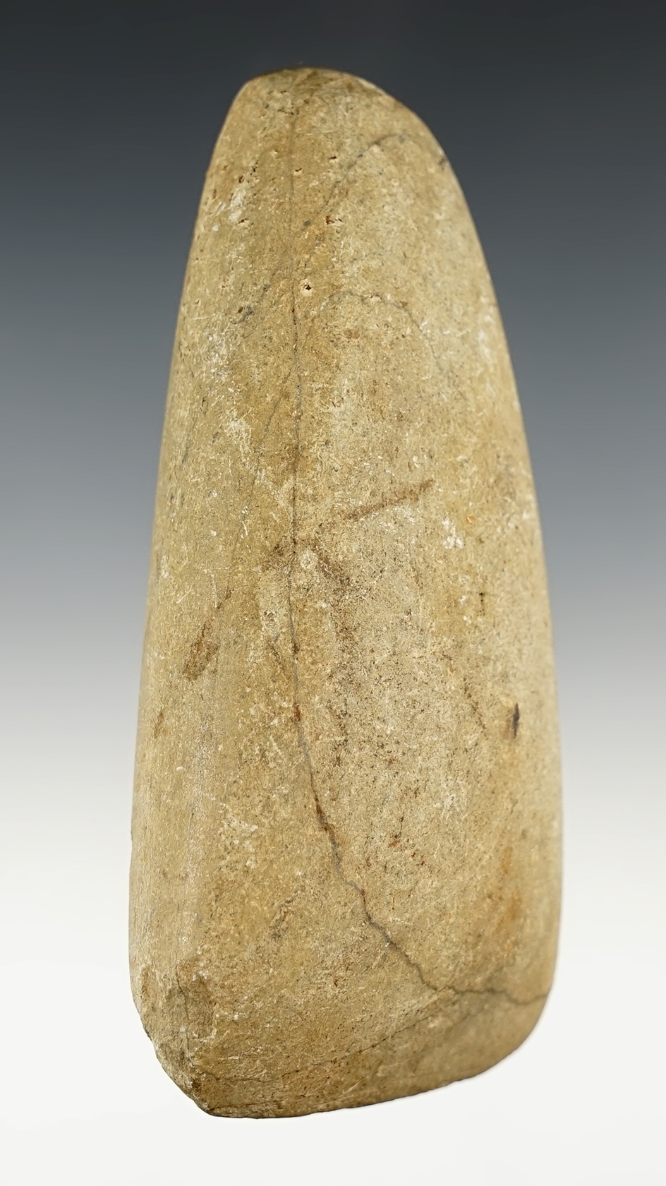 4 9/16" patinated Celt found in Massachusetts. Good overall polish.