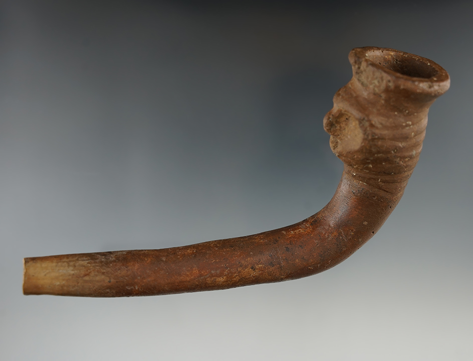 5 1/8" Iroquois Clay Human Effigy Pipe with restoration to elbow and a broken and mended stem