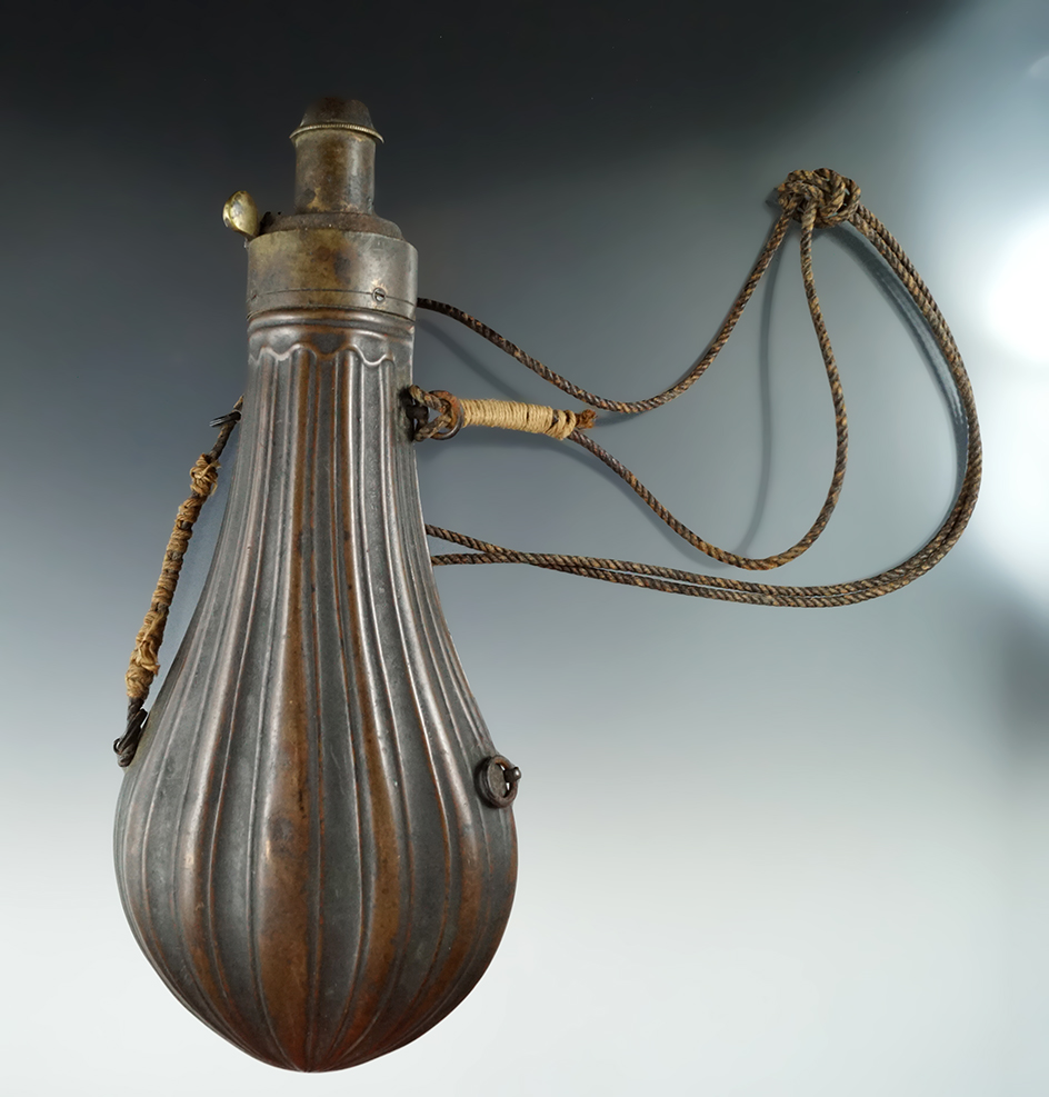 Nicely decorated circa 1800's 7 3/4" brass Powder Flask in excellent condition.