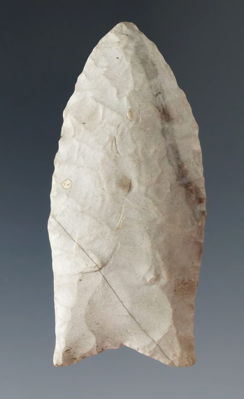 2 5/16" Fluted Paleo Clovis found in Michigan.