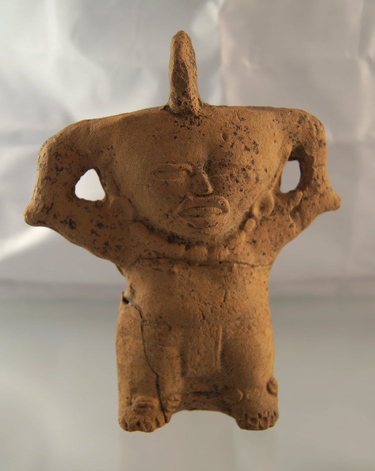 6 1/4" pre-Columbian figurine found in Mexico with multiple pieces that are broken and glued.