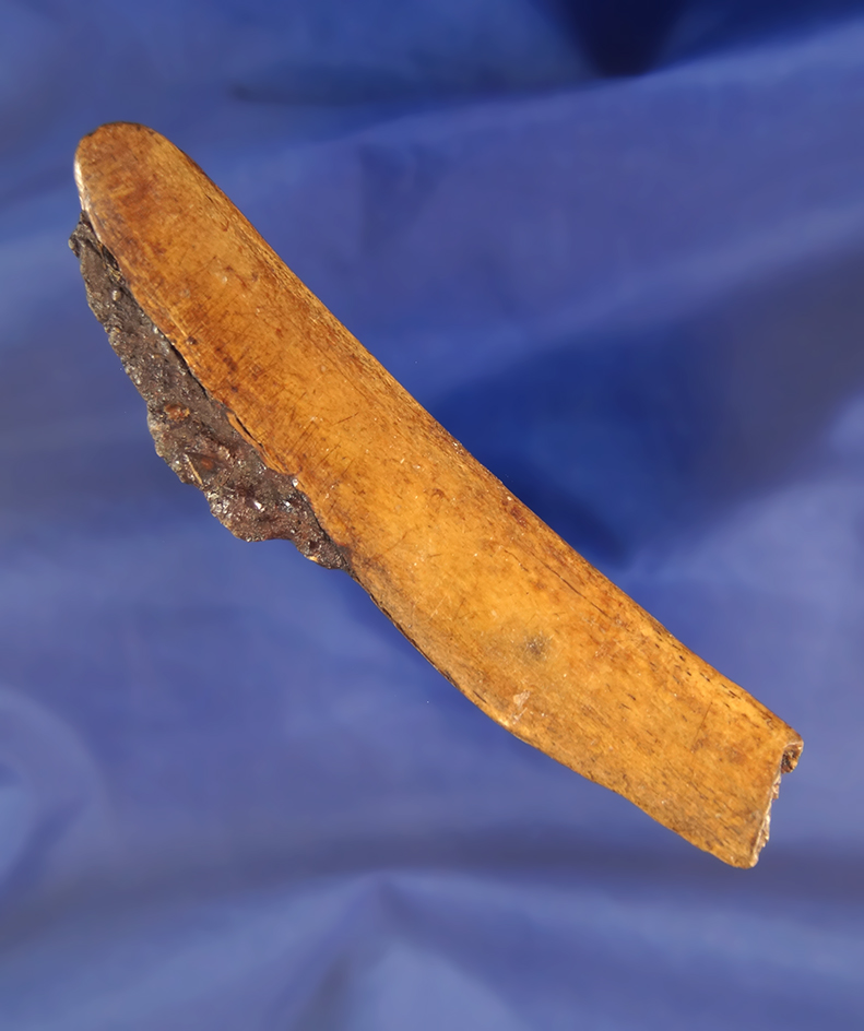 Very unique rib bone with original metal blade hafted in it. Found in Alaska. Ex. Jake Vahle collect