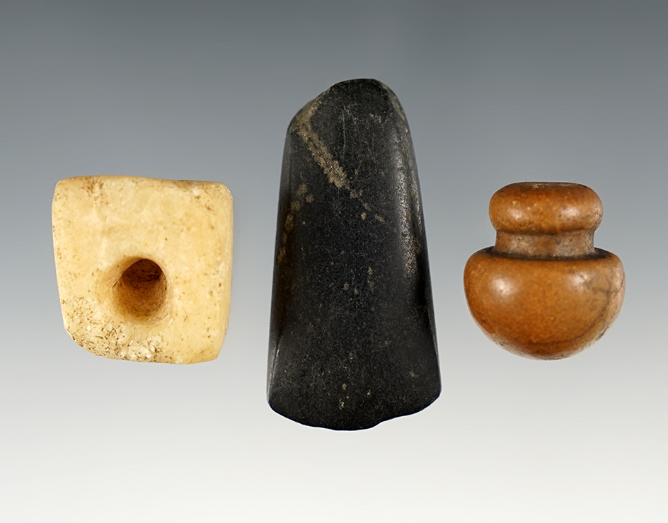 Assorted artifacts consisting of a Quartz Pipe, Ear Plug, and Mini Celt. Ex. Sauer, Ex. Edwards.