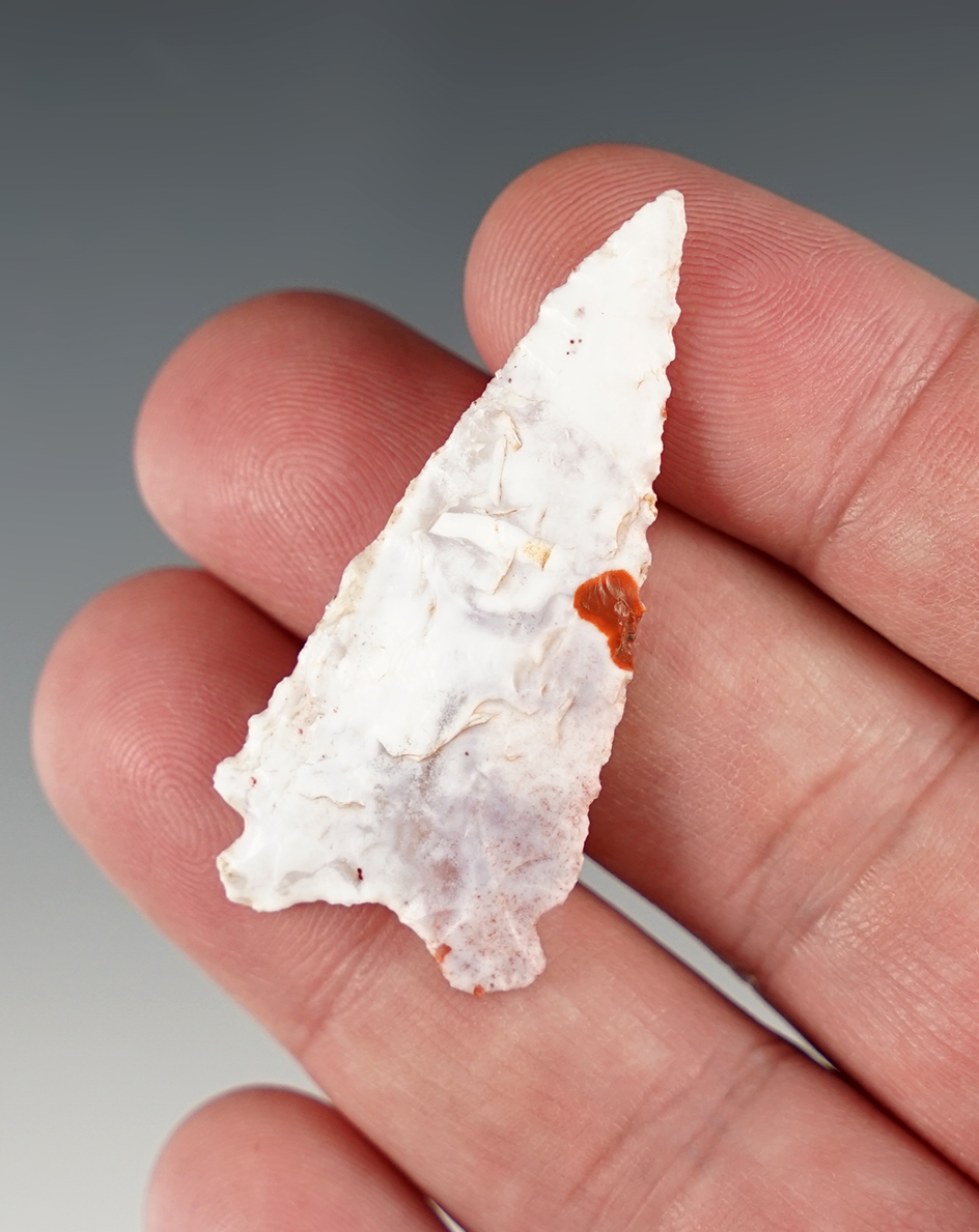 Fine 1 7/8" Archaic Dart point found in Utah. Ex. Robert Roth collection.