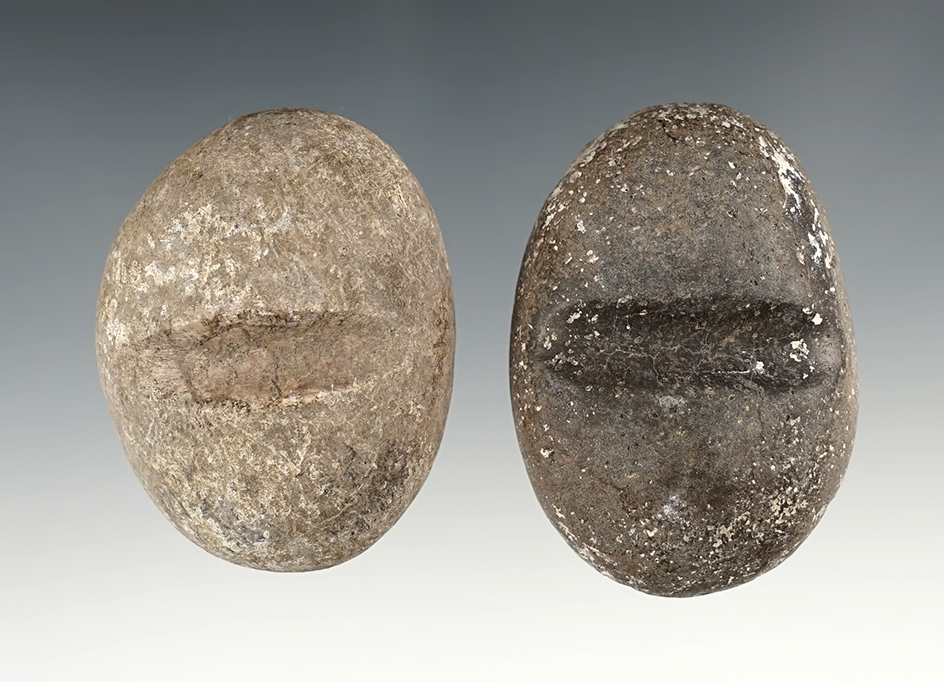 Pair of New Mexico Stone Arrow Shaft Smoothers. The largest is 2 5/16".