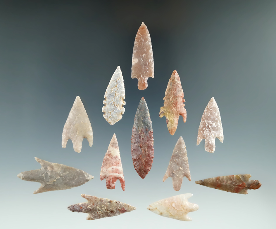 Set of 12 well styled African Neolithic arrowheads found in the northern Sahara desert region.