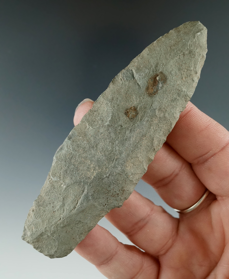 3 7/8" Paleo Stemmed Lanceolate with heavily ground stem area found in Michigan.