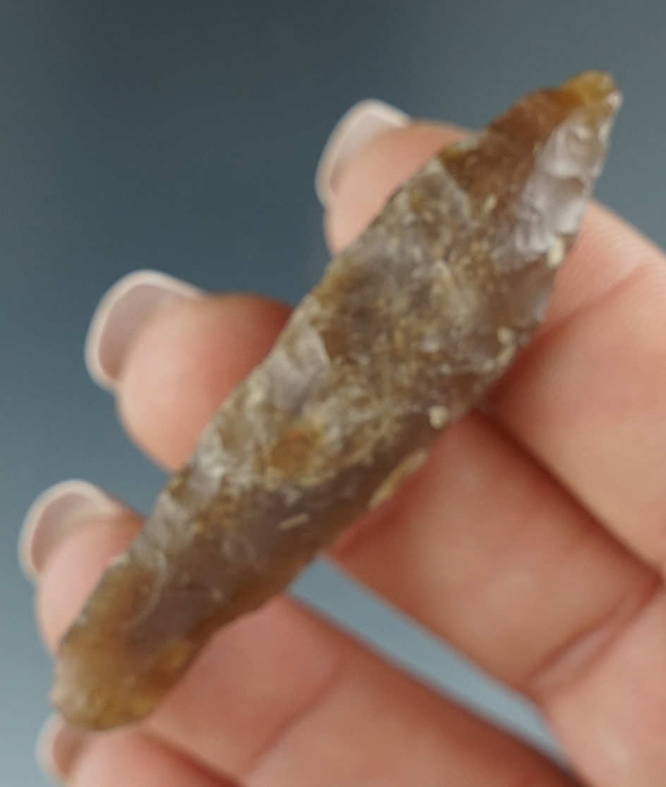 2 3/8" Agate Basin made from Knife River Flint found in Cheyenne Co.,Colorado. Davis COA.