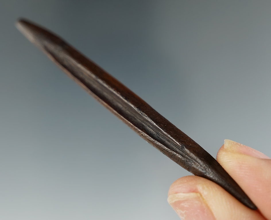 4 1/16" River patinated bone projectile point found in Columbia Co.,Florida.