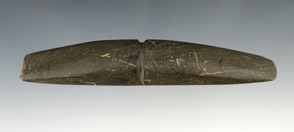 Fine example of a Center Grooved Elliptical Atlatl Weight.