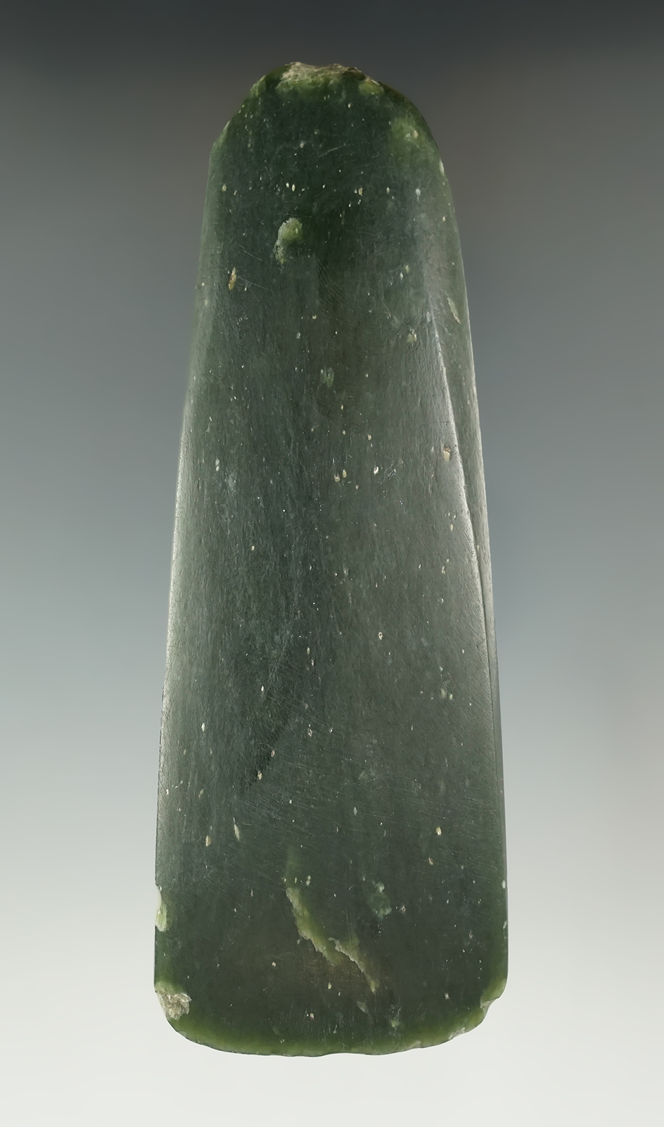 5 9/16" Highly polished Celt made from attractive green polished Jadeite. Pacific Northwest.