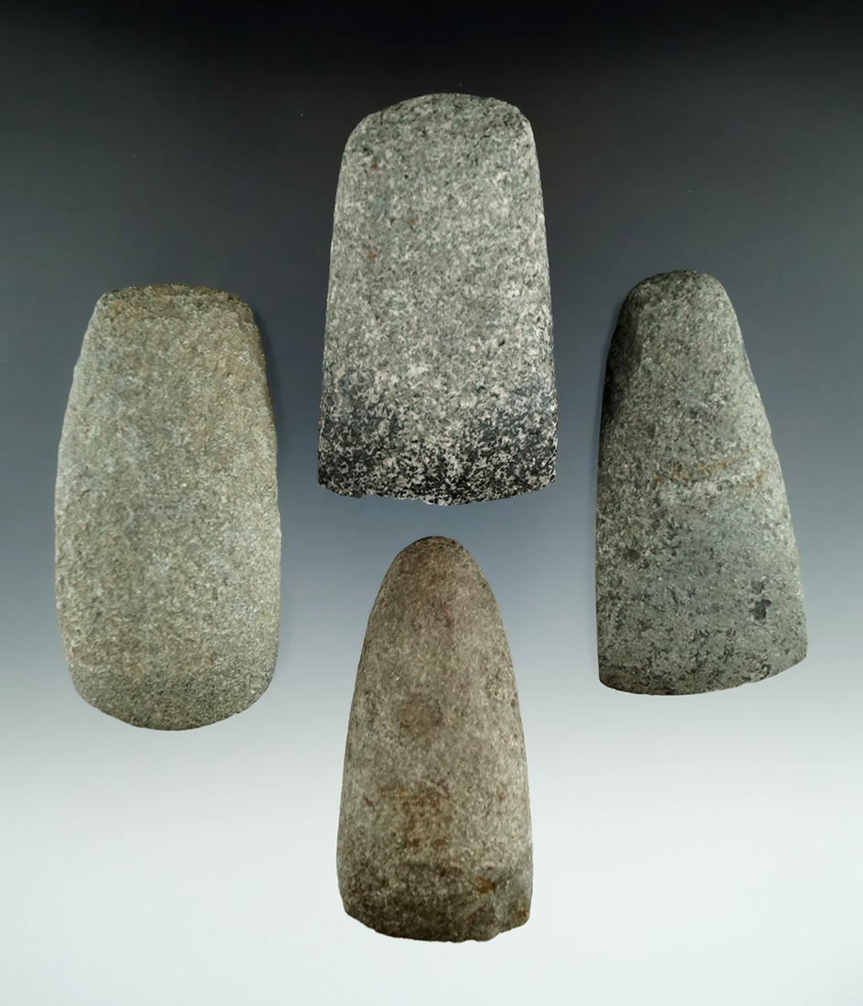 Group of four Celts and adzes, all in good condition, found in Michigan. Largest is 3".