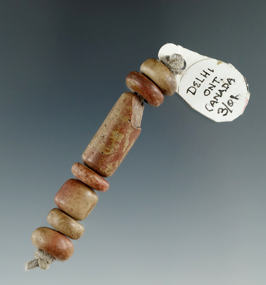 Nice strand of seven drilled stone beads found on a village site near the Cayuga River, Ontario, CA.