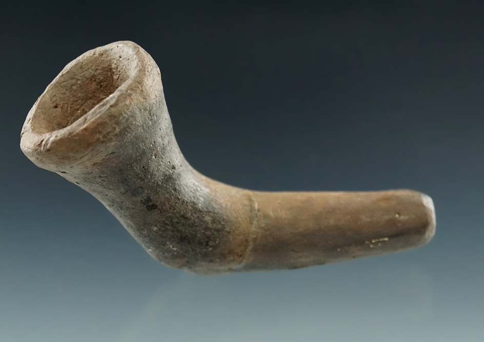 3" miniature Iroquois clay trumpet pipe - some restoration. Found in New York.
