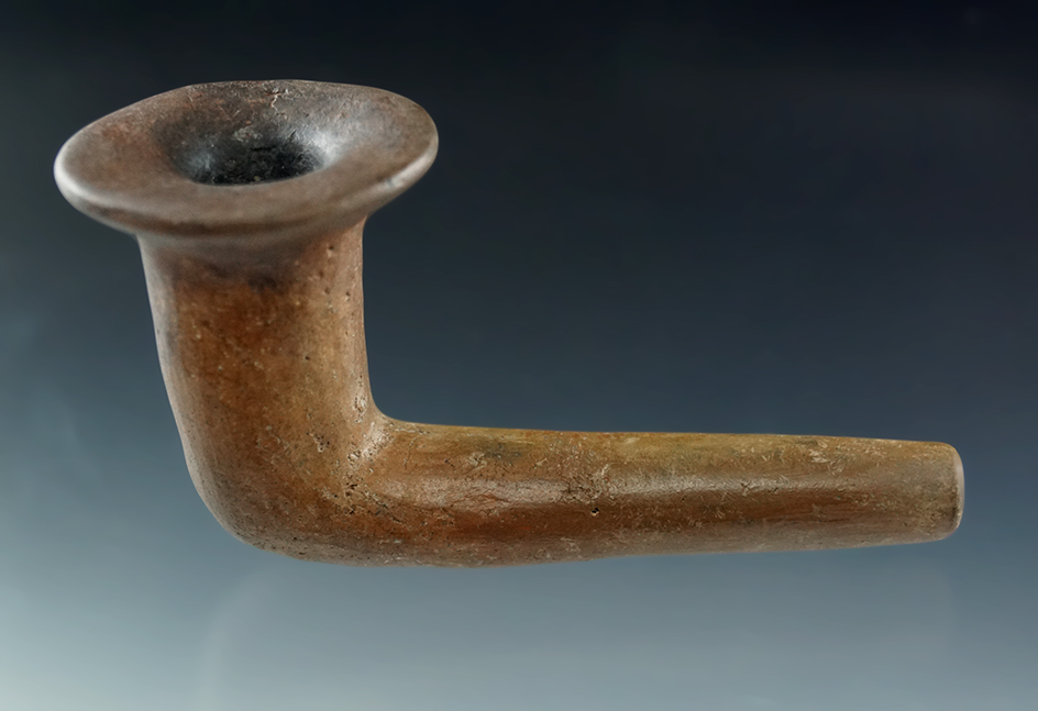 3 5/8" long Iroquois trumpet pipe with a broken and mended stem and restoration to the flared rim.