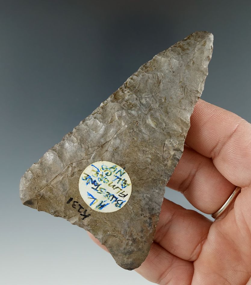 3 9/16" large Triangular Knife made from Onondaga Flint with restoration to 1 ear.  New York.