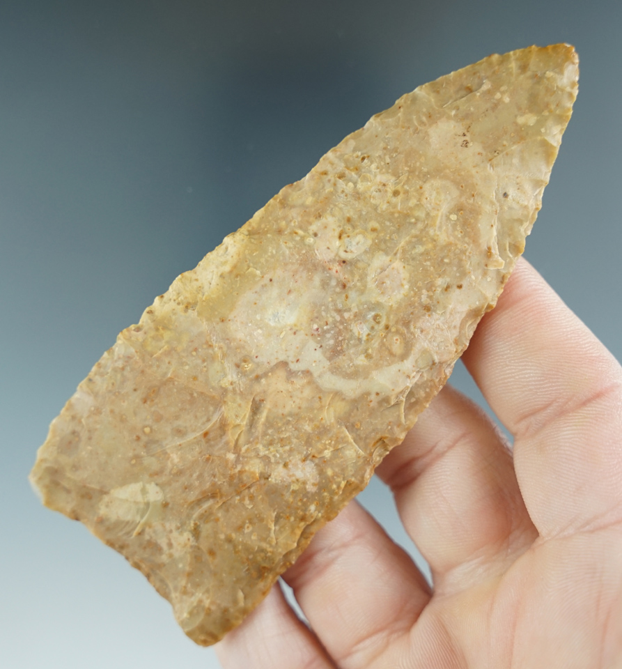 4 1/16" Triangular Knife made from tan chert, found in Western Nebraska.  Perino COA.