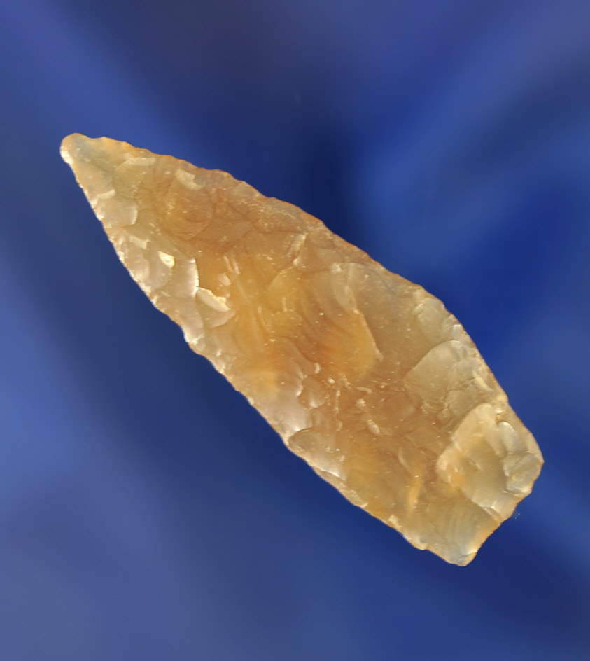 Highly translucent 1 11/16" agate constricted base point. Wyoming.