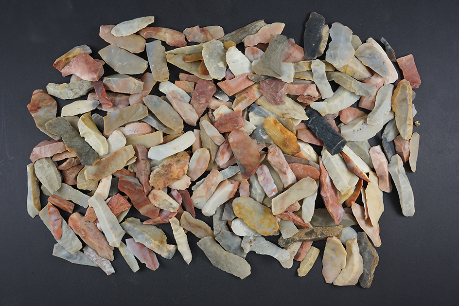 Set of 200 Hopewell Bladelets made from colorful Flint Ridge flint. Found in Ohio.