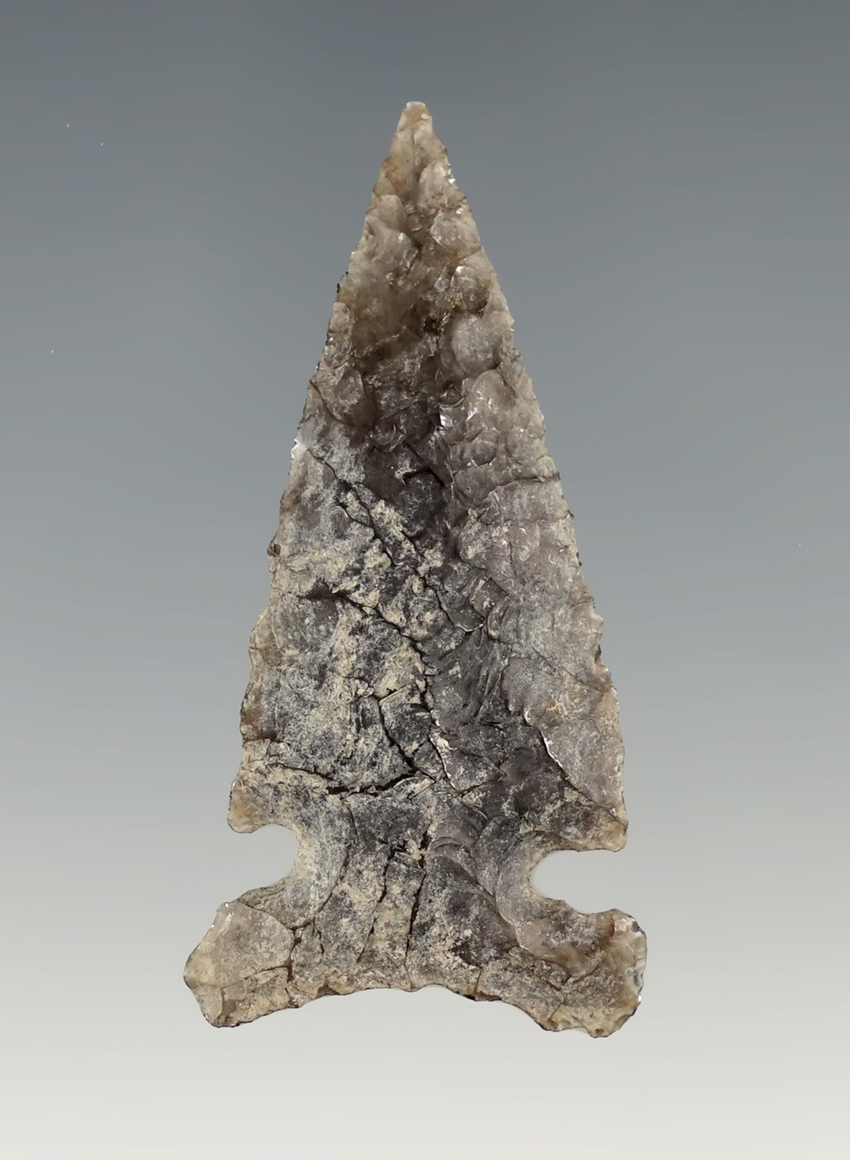 1 3/4" Heavily patinated Side Notch made from Obsidian and found in Lake Co., Oregon.