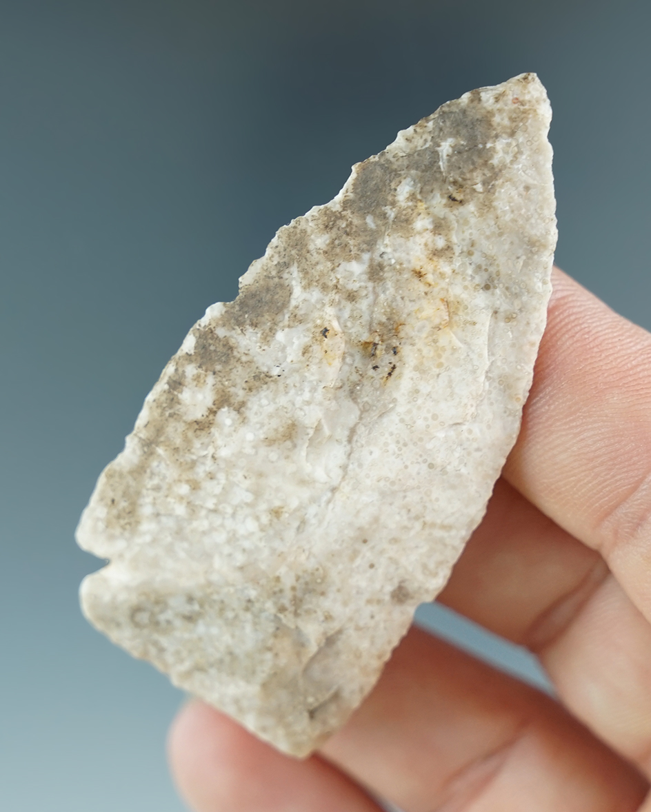 2 9/16" Paleo Lanceolate with nicely ground lower edges and base. Found near Mobridge, ND