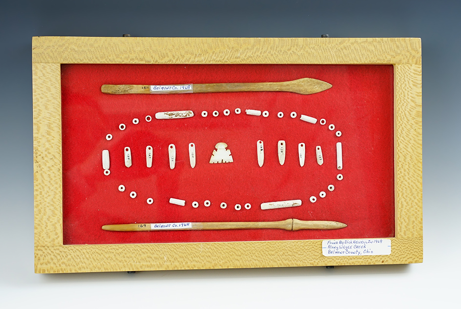 framed display of shell & bone artifacts recovered in Ohio.