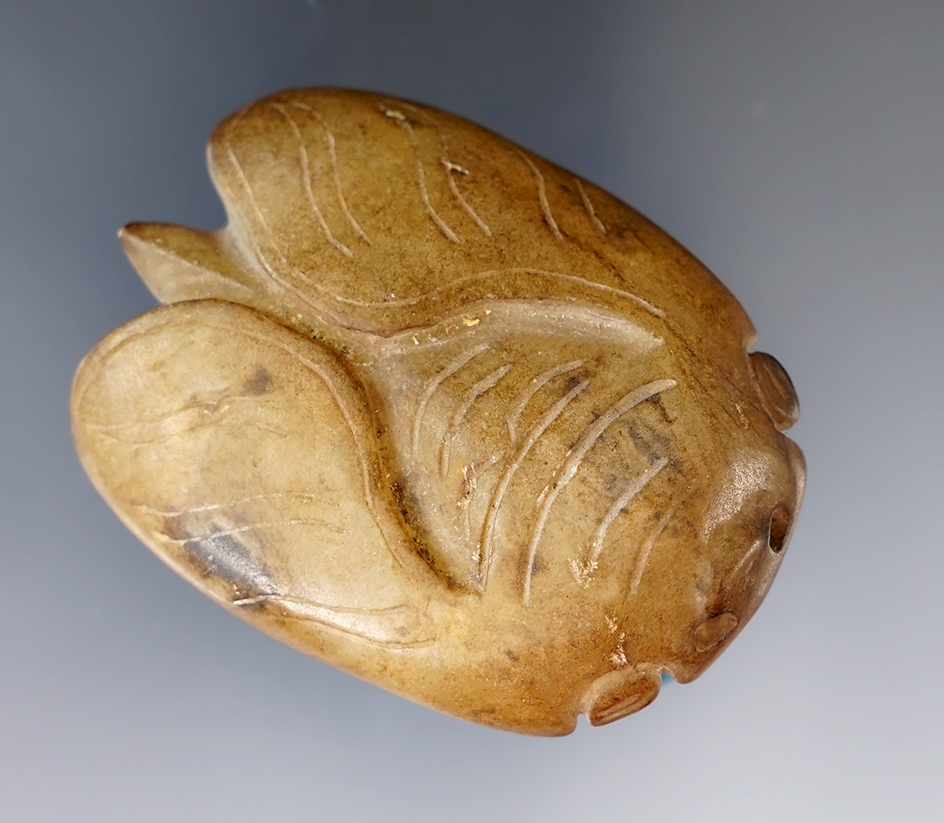 2 5/16" "rebirth offering" figural pendant. Southeast Asia.