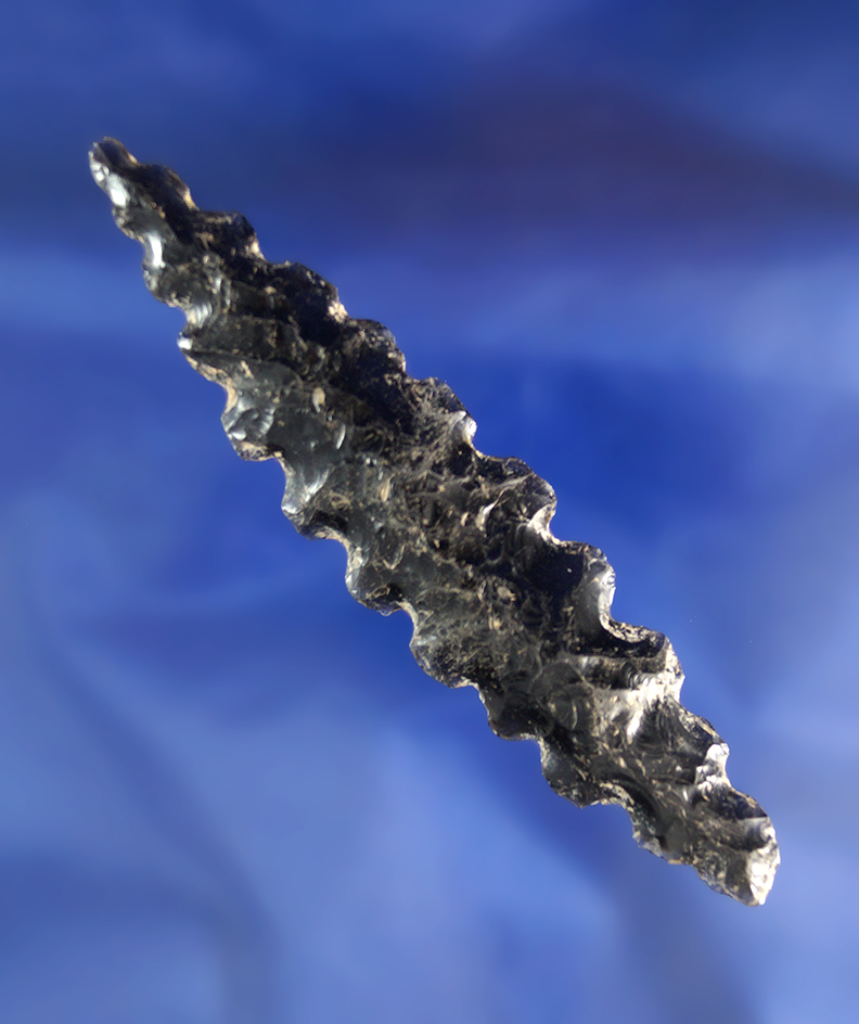 3 3/4" nicely serrated knife that is well patinated found in Mexico.