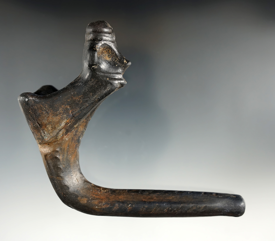 5" long x 4 1/4" tall Huronian Pinched Face Blower Pipe made from clay with moderate restoration.