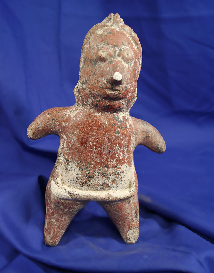 7 1/2" tall Colima Pottery figure in good condition with a restored nose found in West Mexico.