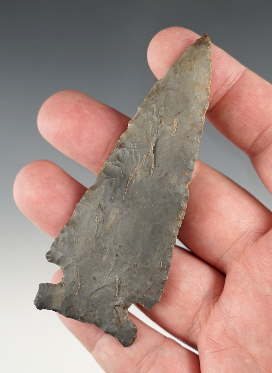 Well made 3 5/8" Archaic Corner Notch made of highly patinated gray Flint. Found in Indiana.