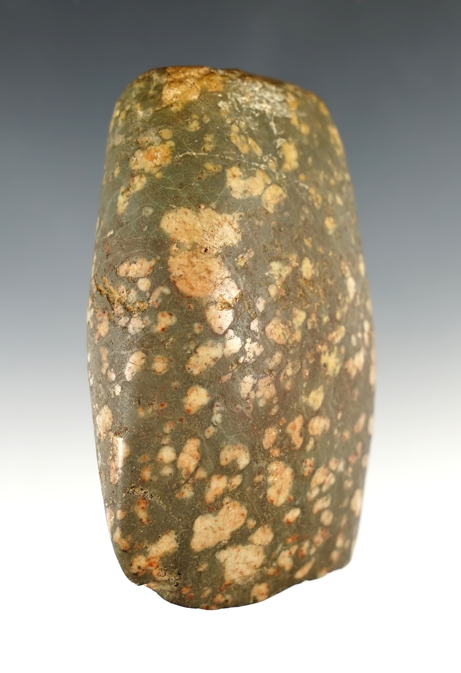 3 5/8" Porphyry Axe that is very well polished. Found in Ohio.