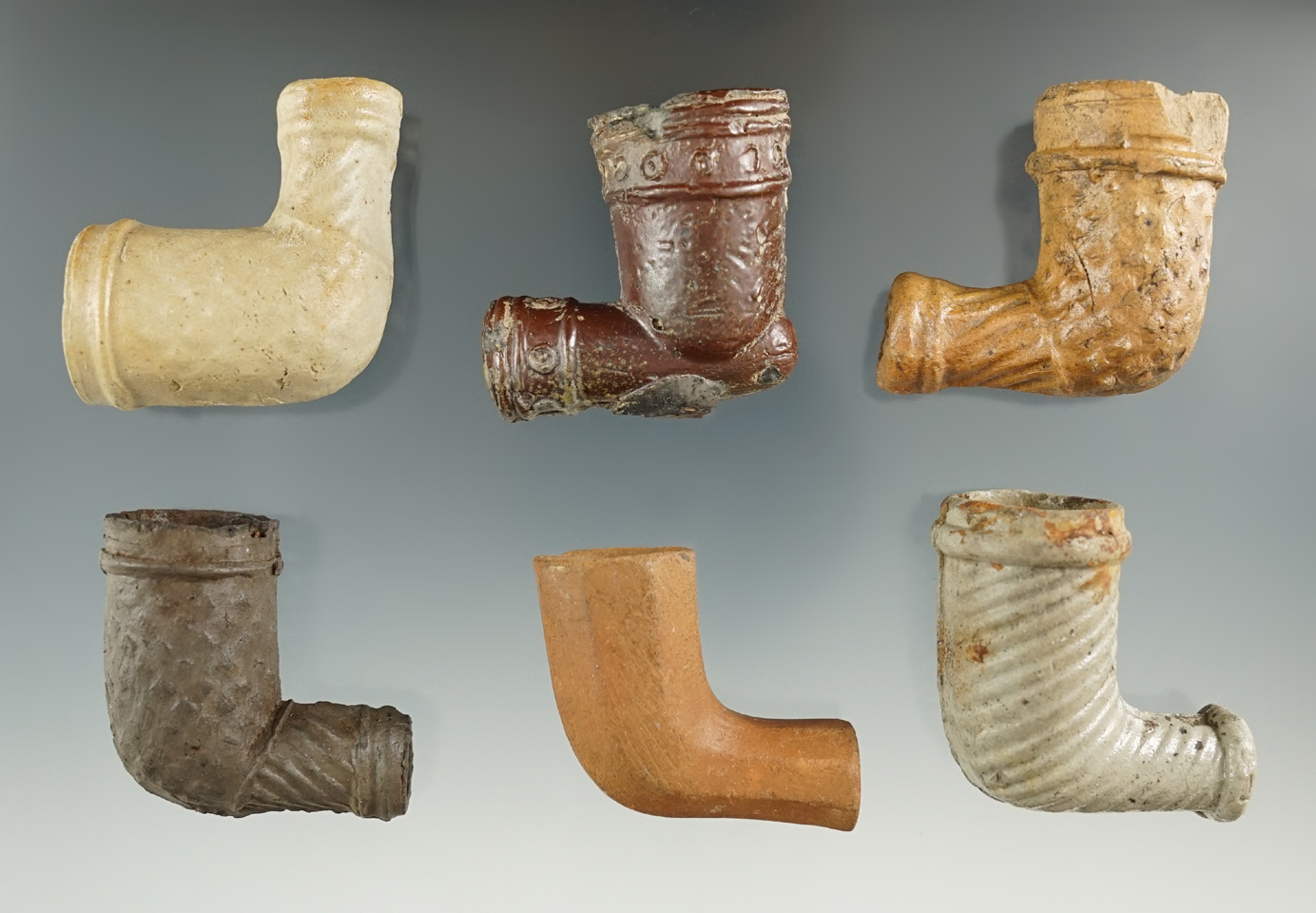 Group of six clay trade pipes found in Scioto Co., Ohio, all around 1 5/8 inches long. Bennett COA.